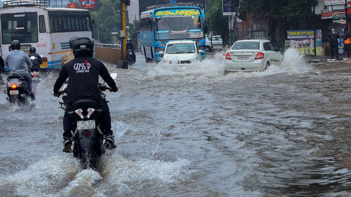 Since Friday (Oct. 15) heavy downpour have been lashing the state leaving roads at several places flooded and waterlogging affecting the normal life at quite a number of places. Credit: PTI Photo