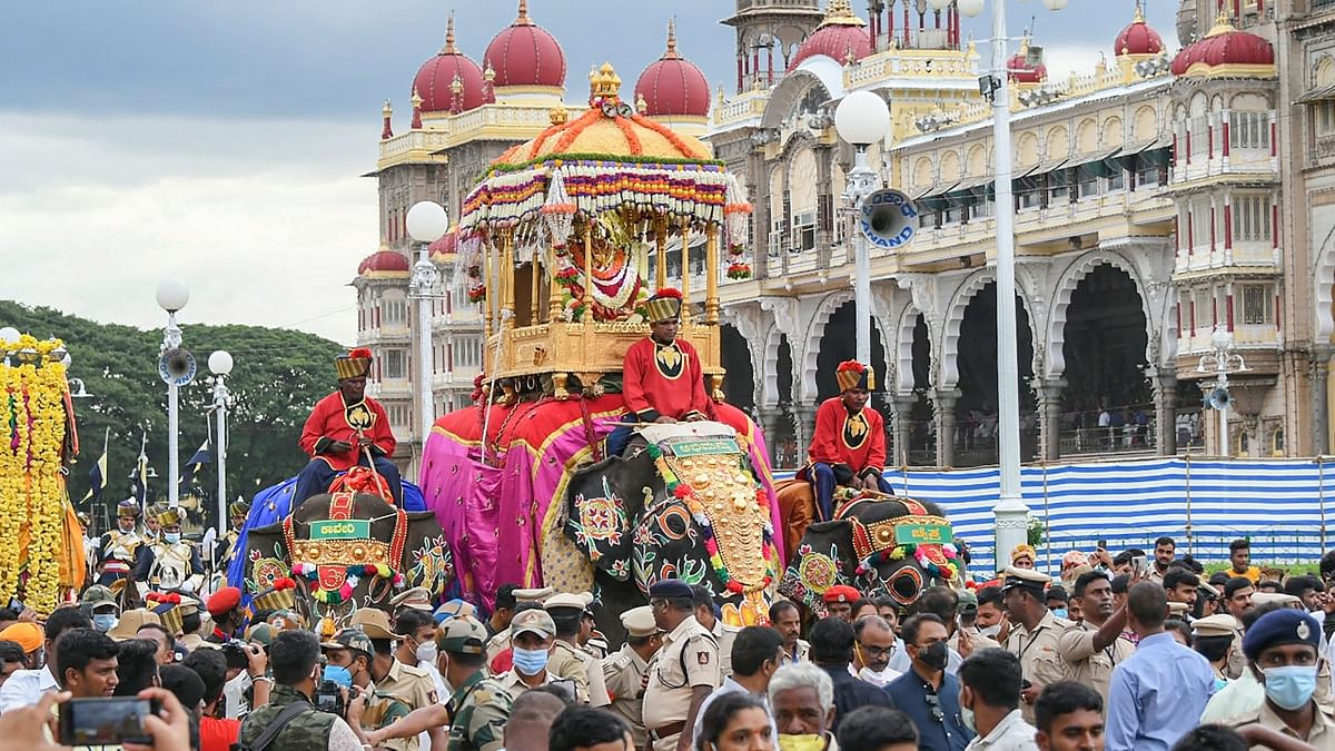 The gigantic Abhimanyu, a caparisoned elephant, carrying the presiding deity on the 750 kg golden howdah, marched and other decorated pachyderms too walked behind it. Credit: PTI Photo