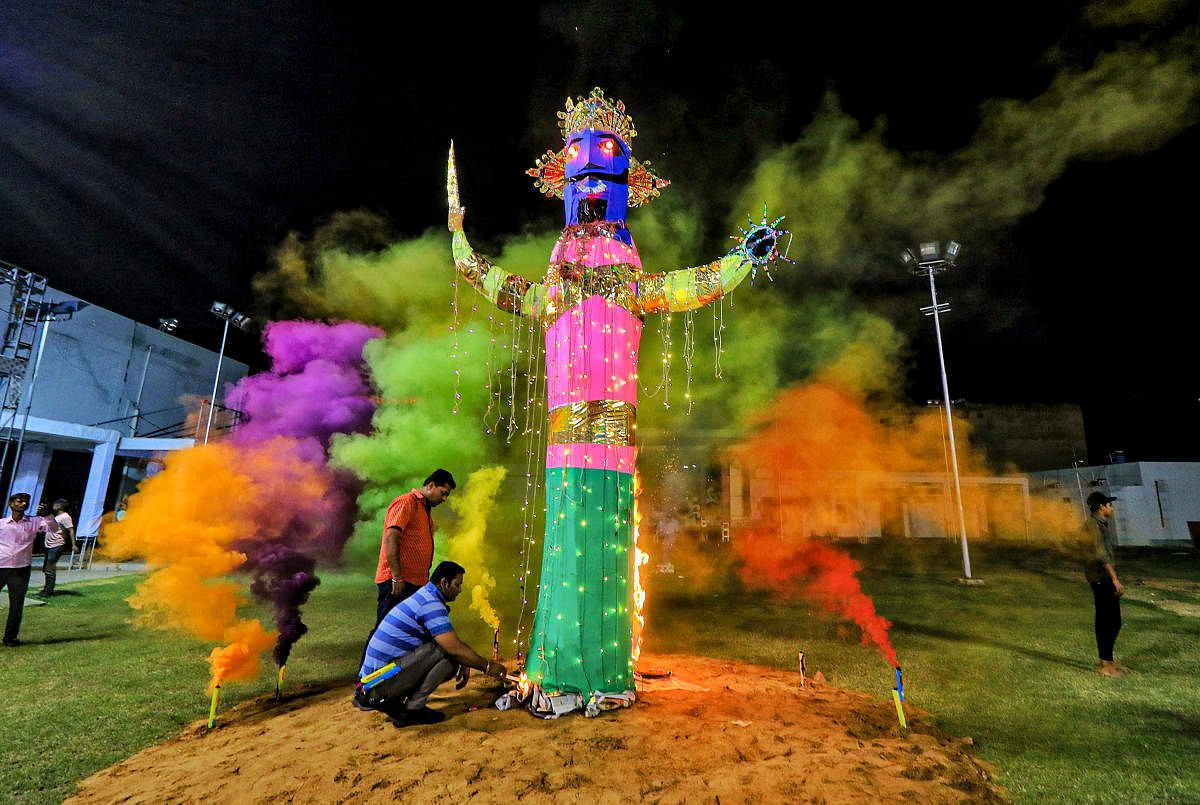 An effigy of Ravana burns during the Dussehra celebrations at Shree Rammandir Adarsh Nagar, in Jaipur. Credit: PTI Photo