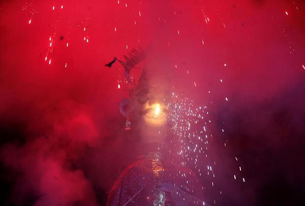 Fireworks explode as an effigy of Meghnad, son of demon king Ravana, burns during Vijaya Dashmi celebrations in Ahmedabad, India. Credit: Reuters Photo