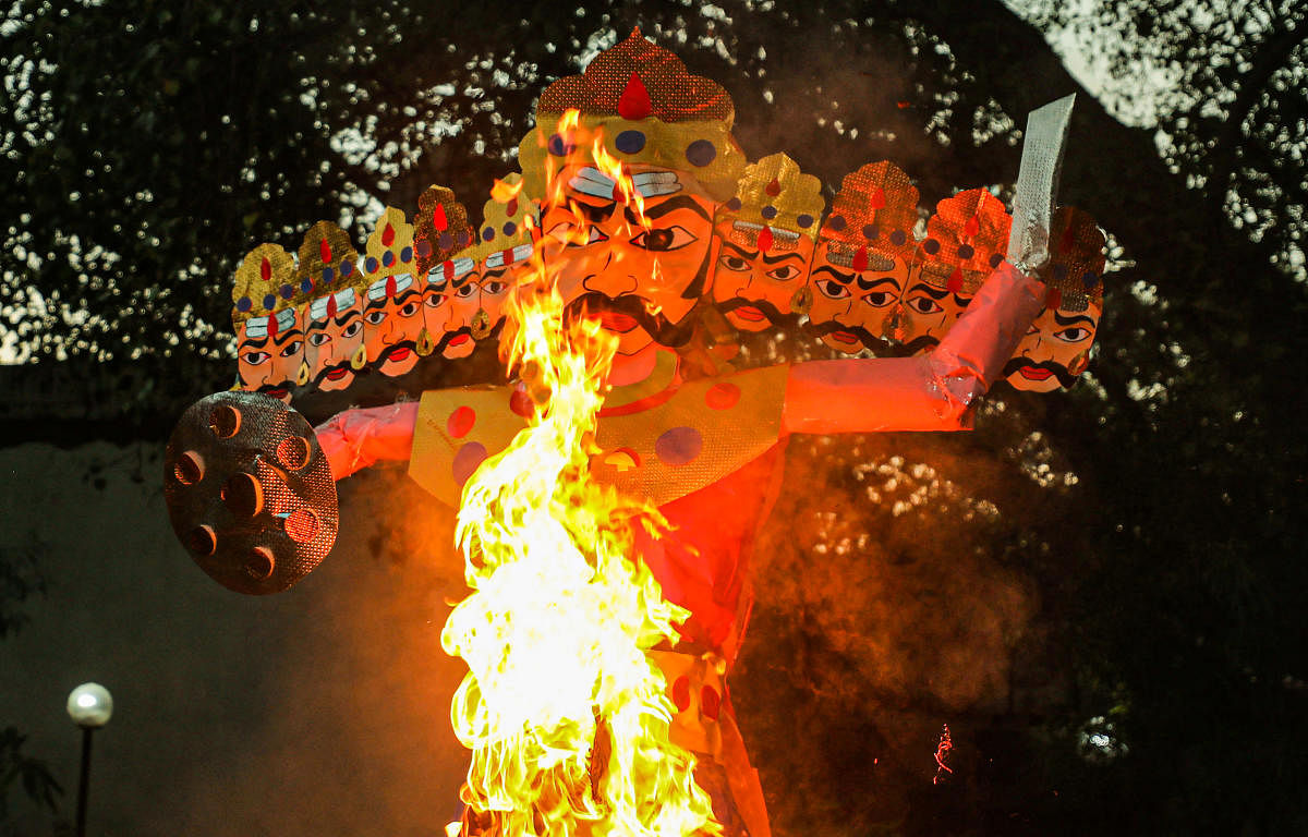 An effigy of Ravana in flames marking the end of the Dussehra festival, in Jammu. Credit: PTI Photo