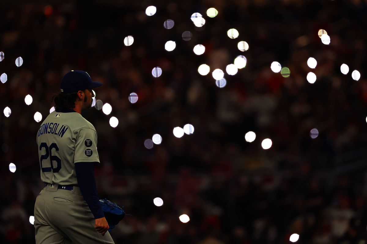 Tony Gonsolin #26 of the Los Angeles Dodgers enters the game against the Atlanta Braves during the fourth inning of Game One of the National League Championship Series. Credit: AFP Photo