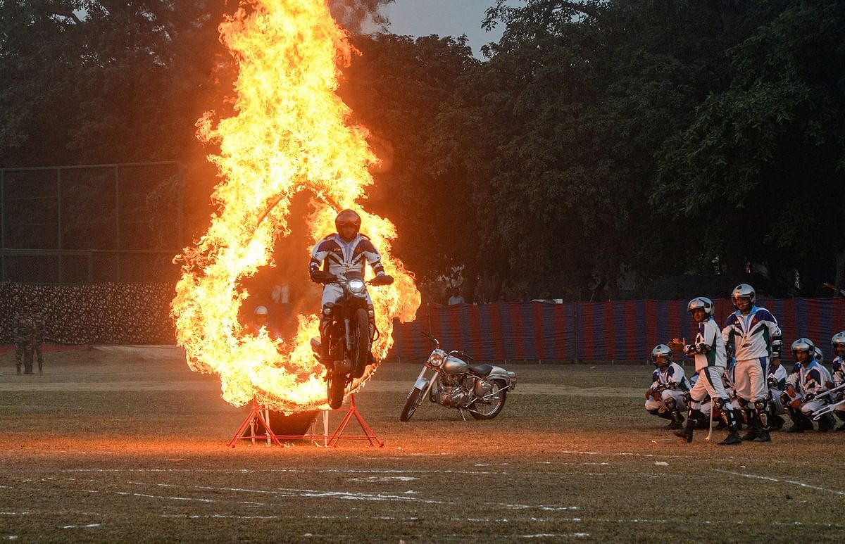 Army personnel perform stunts during an event to mark to 'Swarnim Vijay Varsh' in Jalandhar. Credit: PTI Photo