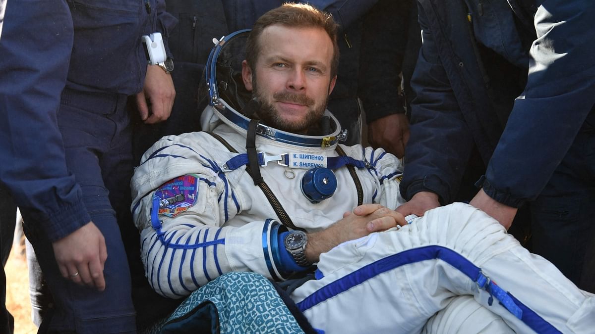 Russian film director Klim Shipenko is seen resting in a chair after the landing of the Russian Soyuz MS-18 space capsule in Kazakhstan. Credit: Russian Space Agency Roscosmos/AFP Photo