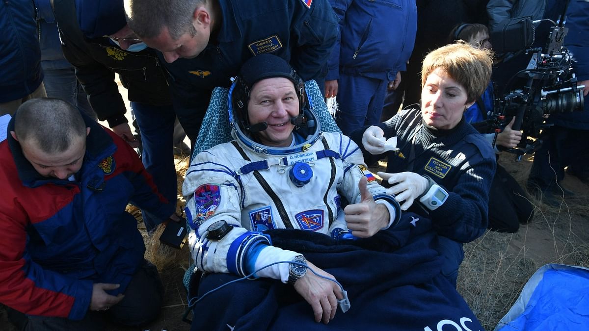 The Russian space agency said that the crew felt well ahead of their exit from the Soyuz and would undergo a 10-day rehabilitation to help recover from the effects of living in the microgravity environment of low-earth orbit. Credit: Russian Space Agency Roscosmos/AFP Photo