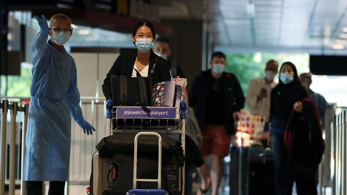 First expanded vaccinated travel lane flight arrives in Singapore. Credit: Reuters Photo