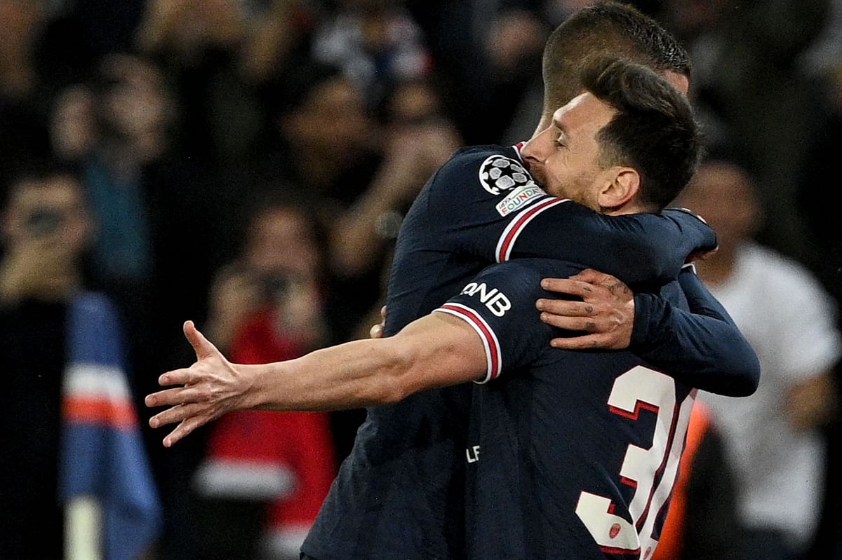 Paris Saint-Germain's Argentinian forward Lionel Messi celebrates with teammate after scoring a goal during the UEFA Champions League first round Group A football match between Paris Saint-Germain's (PSG) and RB Leipzig. Credit:: AFP Photo