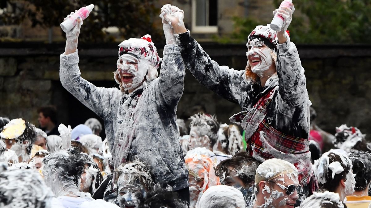 Freshers during the annual Raisin Monday shaving foam fight in the University of St Andrews, Scotland. Credit: AFP Photo