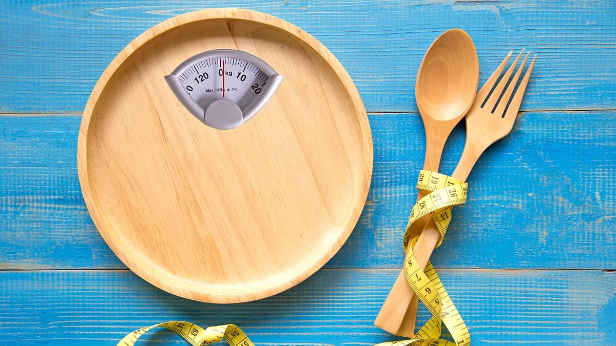 Keep a control on weight: One should keep a check on the weight at regular intervals and if you’re heftier than your ideal weight then it will put you under the risk of high blood pressure and high cholesterol that may weak the heart and hamper its functioning. Credit: Getty Images