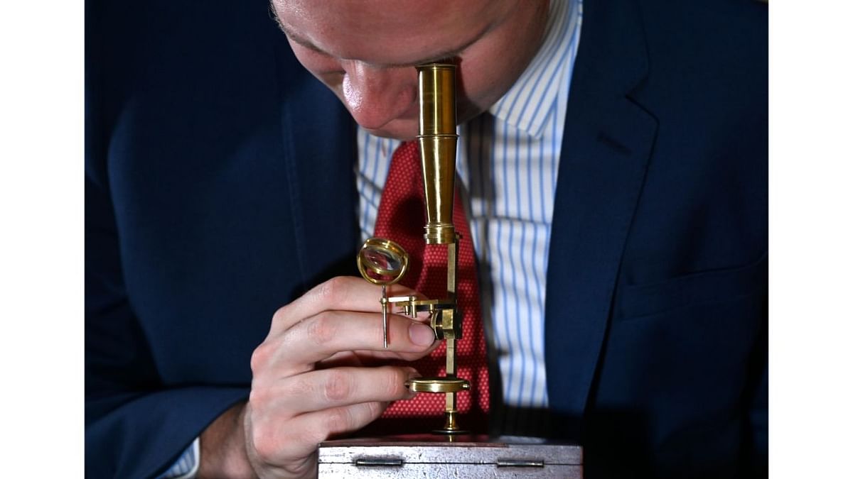 The instrument was designed by Charles Gould for the firm Cary around 1825 and is one of the six surviving microscopes associated with the British naturalist, according to auction house Christie's. Credit: Reuters Photo