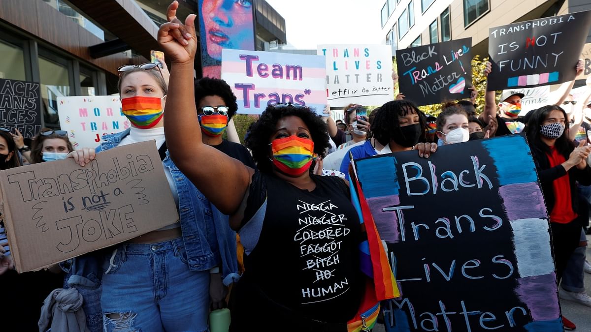 Amid cheers and chants of “Team trans!,” dozens of Netflix employees walked out of a company office building in Los Angeles and held a protest against a recent Dave Chappelle stand-up special. Credit: Reuters Photo