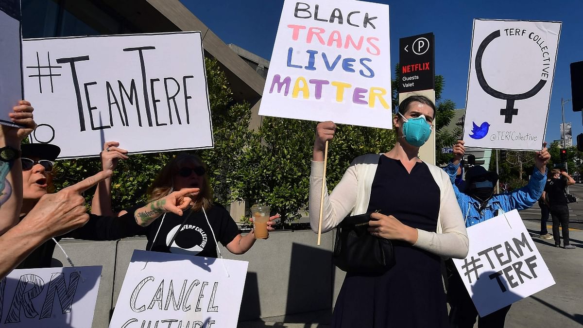 Carrying several placards, the employees joined more than 100 supporters and activists who had begun rallying a couple of hours before. Credit: AFP Photo