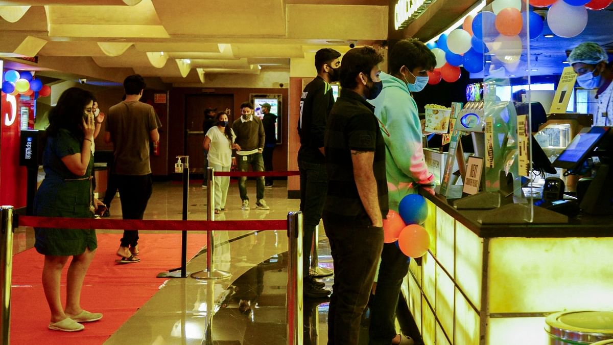 Cinemagoers rejoice as theatres reopen in Maharashtra; See Pics