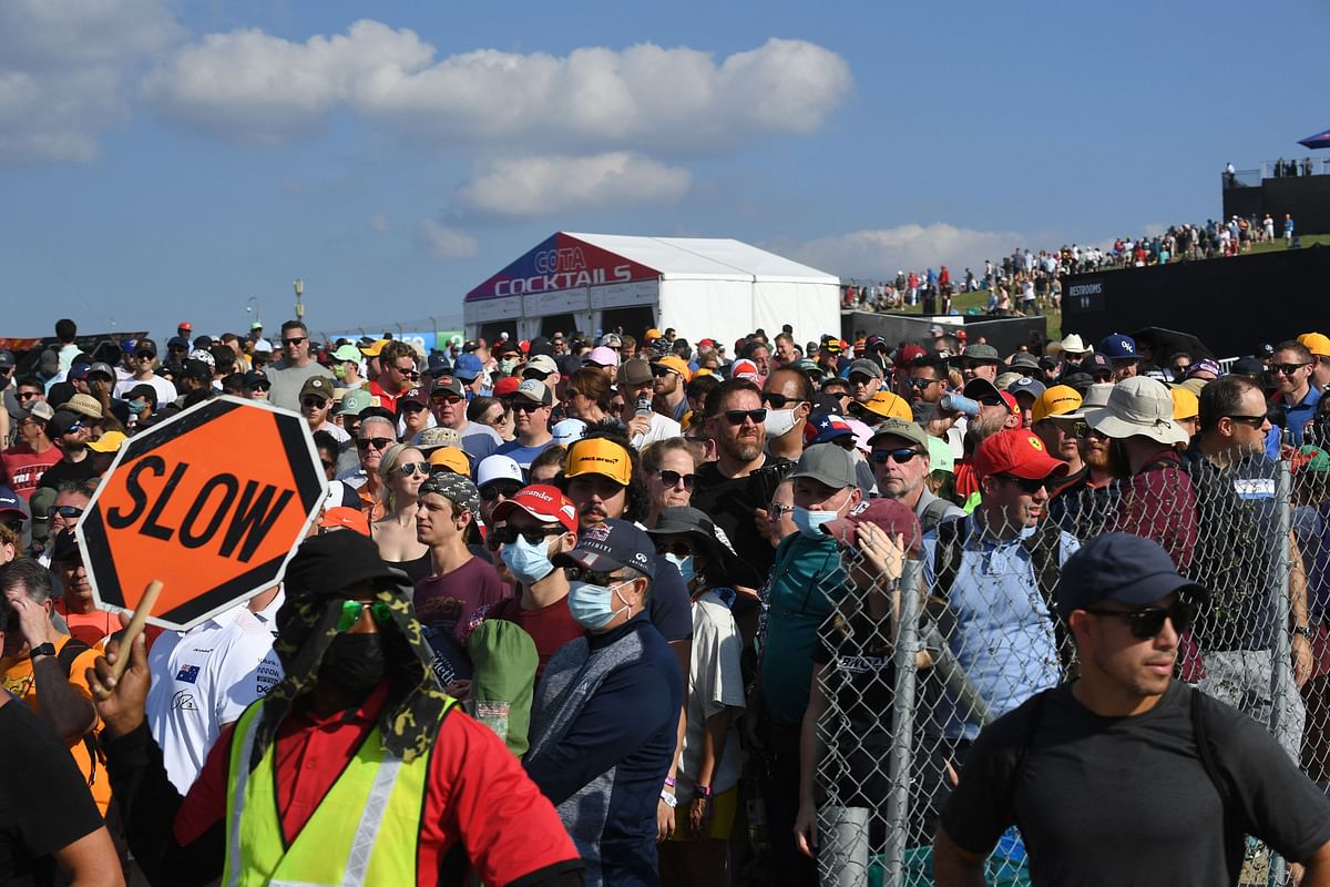 Fans wait to cross the road after the second practice session at the Circuit of The Americas in Austin, Texas. Credit: AFP Photo