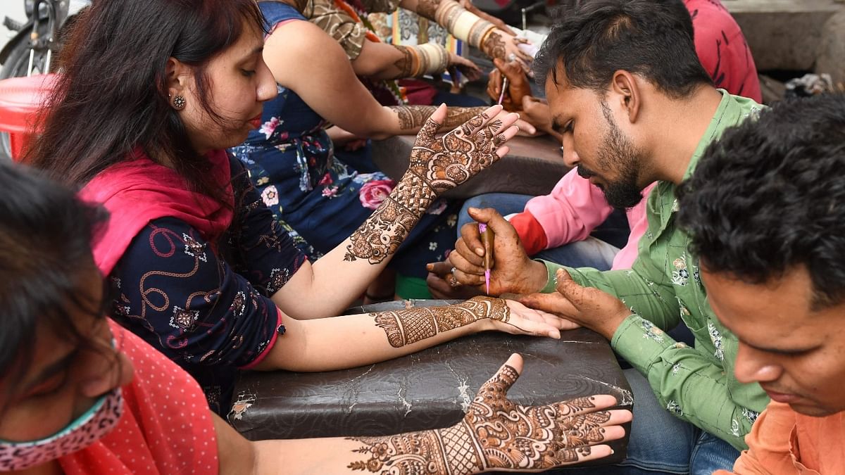 Indian women gear up to celebrate Karva Chauth; see pics