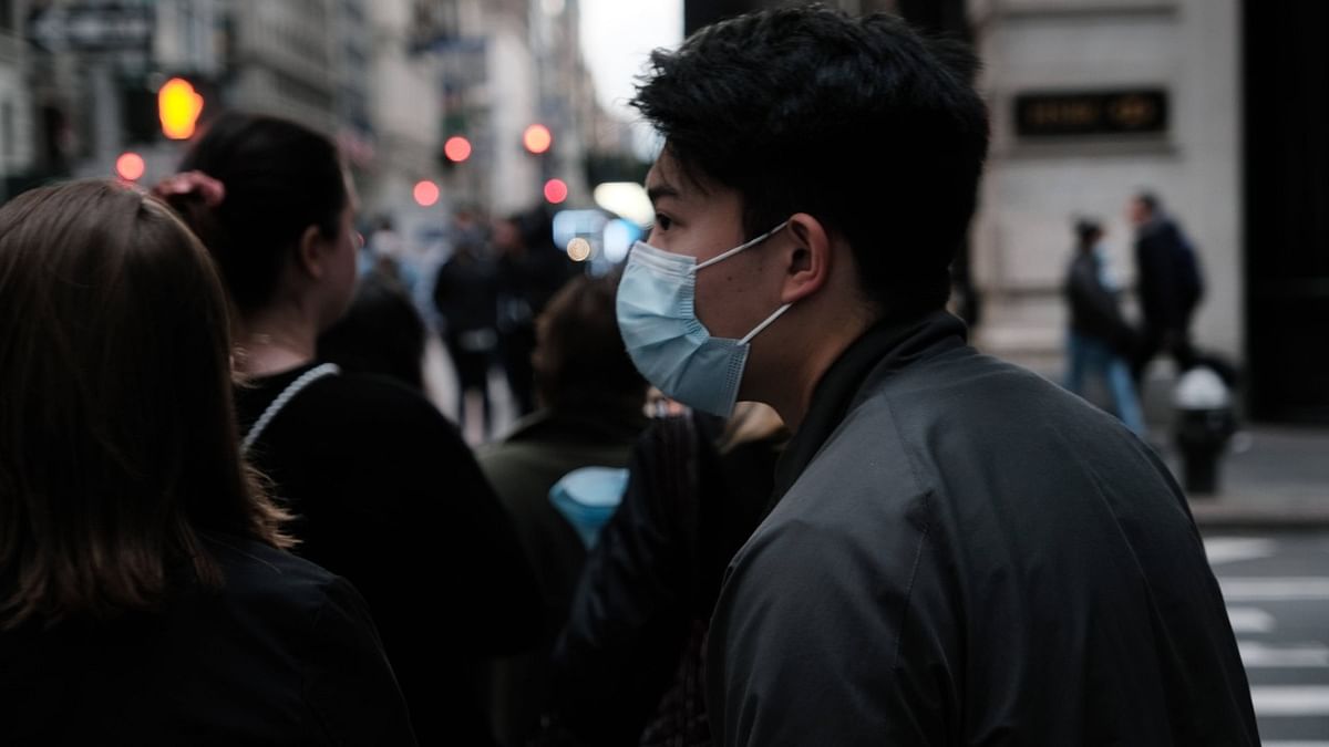 Even as New York City's Covid case count continues to fall, many health experts and epidemiologists believe that the city, and much of the world, will be living with Covid-19 long into the future. As people continue to get vaccinated and wear masks in many social settings, experts believe that Covid-19 will be a present but diminished danger for most people. Credit: AFP Photo