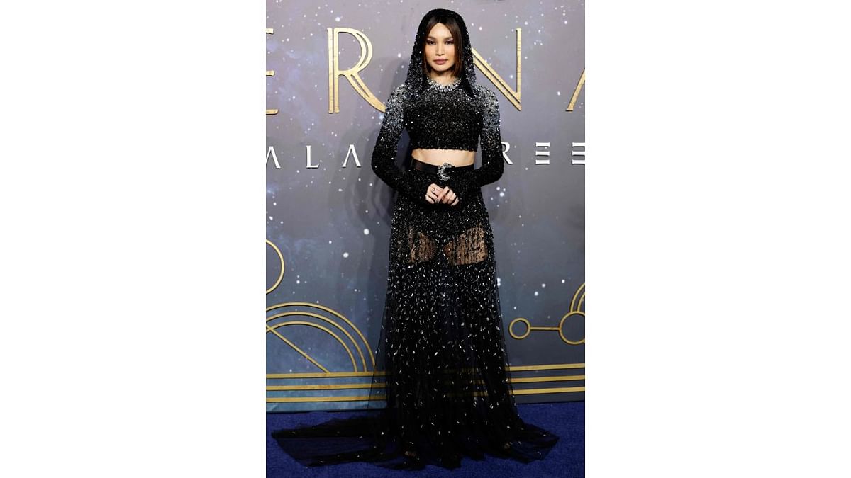 Gemma Chan upped the glam quotient in a black crop top and skirt set. Credit: AFP Photo