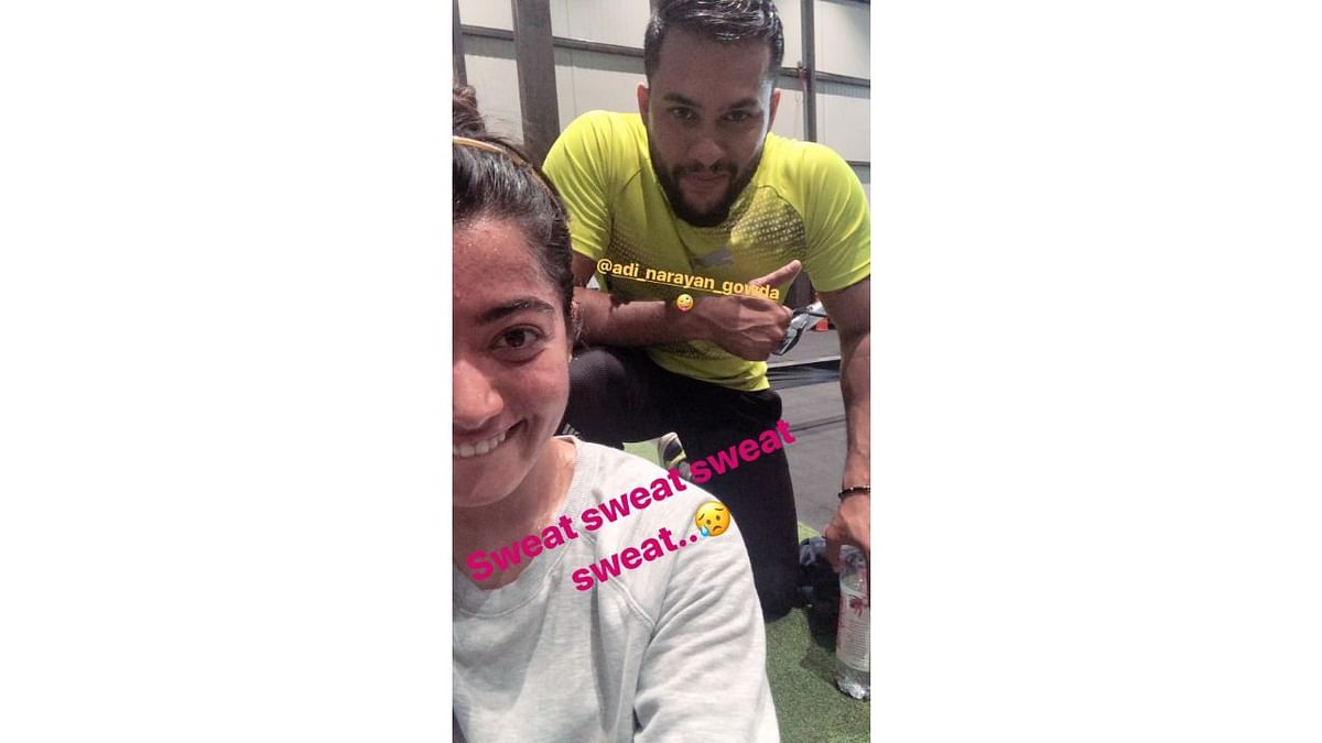 A candid selfie with her trainer. Credit: Instagram/rashmika_mandanna