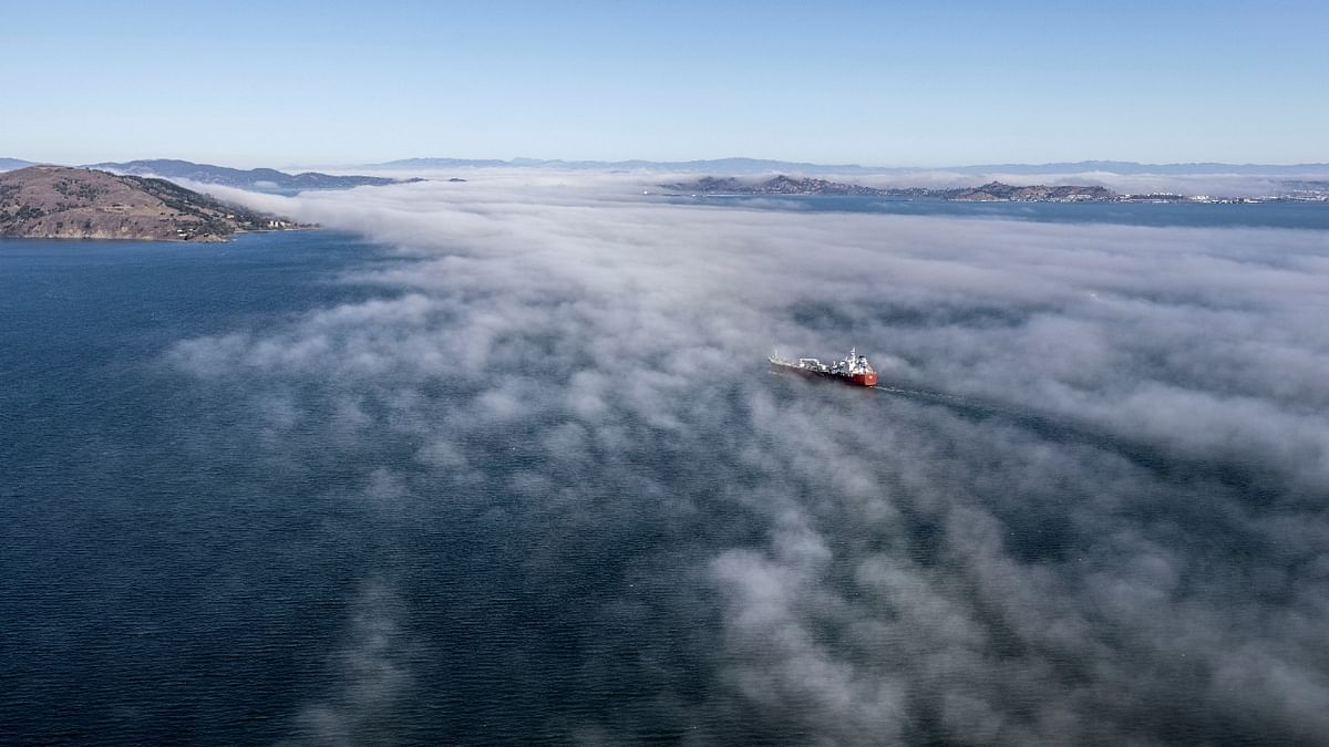 A vessel is seen as clouds cover part of the San Francisco Bay in San Francisco, California. Credit: Reuters Photo
