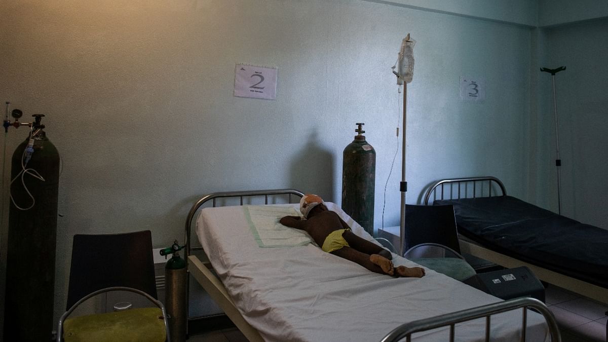 Princesse, 5, who was injured in the head by a stray bullet during clashes between gang members and police, recovers at the Centre Hospitalier du Sacre-Coeur run by Medecins Sans Frontieres, as Haiti's fuel shortages continue to threaten the operations of medical facilities, in Port-au-Prince, Haiti. Credit: Reuters Photo