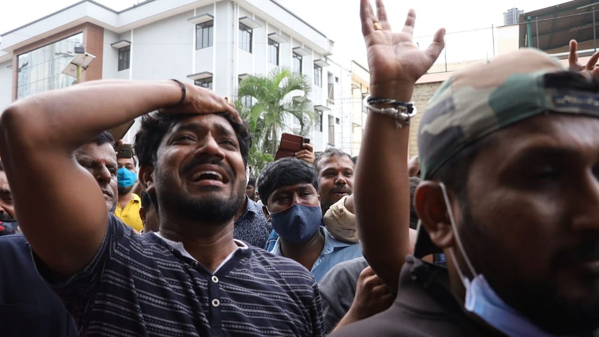 Hundreds of Puneeth's fans gathered outside the hospital after his sudden death from a heart attack at just 46. Credit: Pallav Paliwal