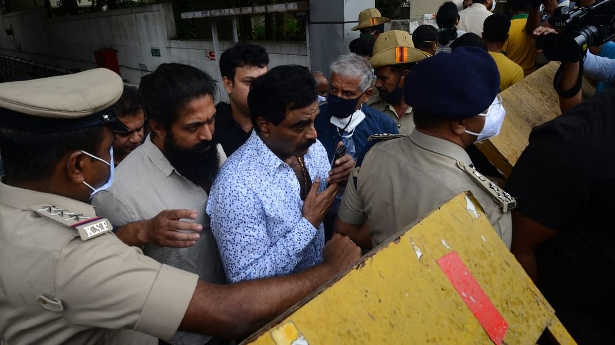 Actor Yash and producer Rockline Venkatesh are seen arriving at the hospital. Credit: Pallav Paliwal