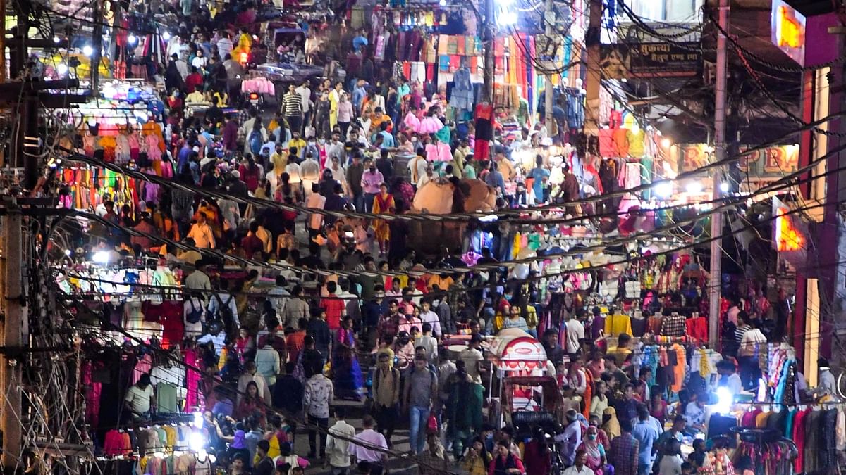 People in large numbers gather at a market to shop on the eve of Diwali festival, in Patna. Credit: PTI Photo