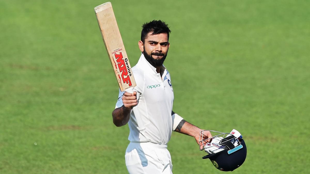 Cricketer Virat Kohli is the first player to score back-to-back three centuries in Test cricket while captaining the team. Credit: AFP Photo