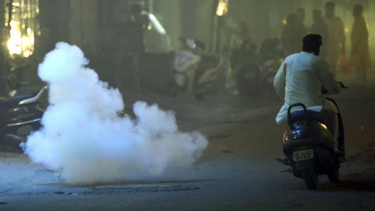 People burst firecrackers in New Delhi. Credit: PTI Photo