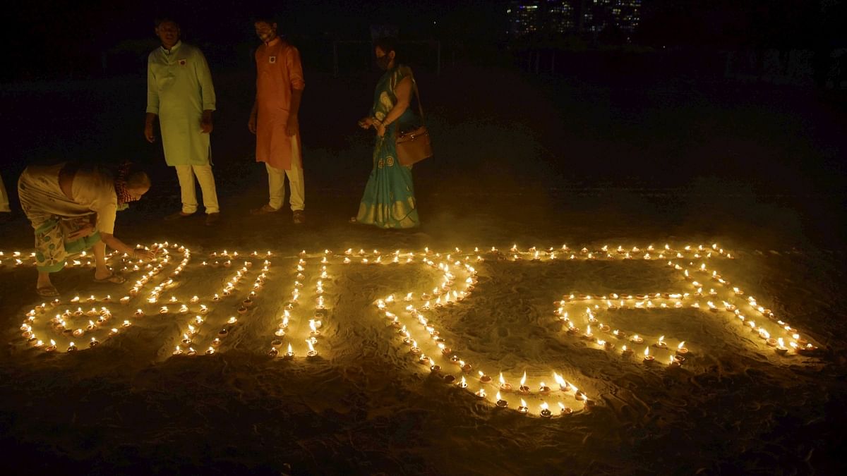 Lamps lit in a formation that reads 'Bharat' during Diwali celebrations at Kharghar in Navi Mumbai. Credit: PTI Photo