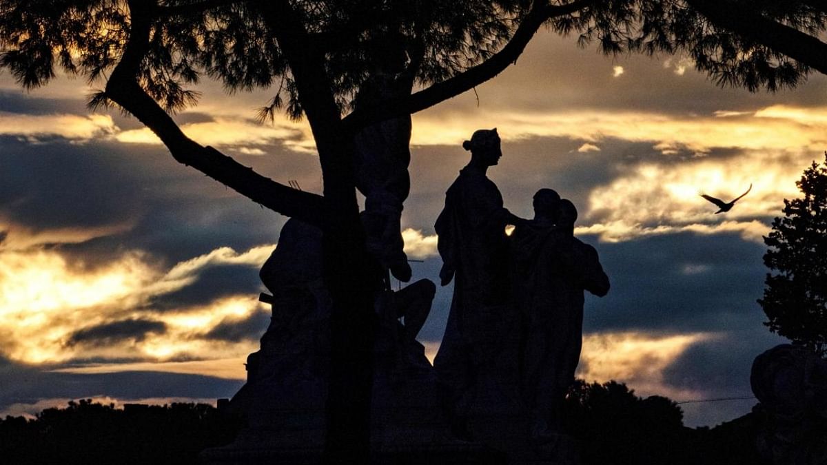 The sun sets over The Vittoriano Monument in Rome. Credit: AFP Photo