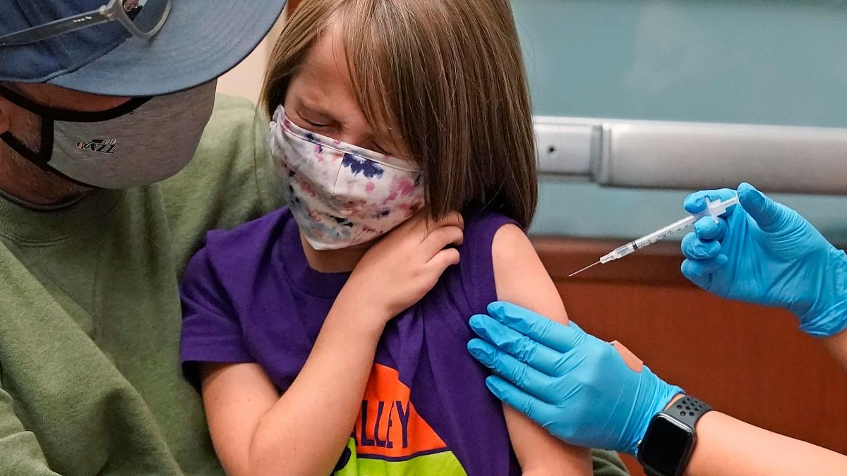 A young girl receives her Covid-19 vaccination at South Main Public Health Center in US. Credit: AP Photo