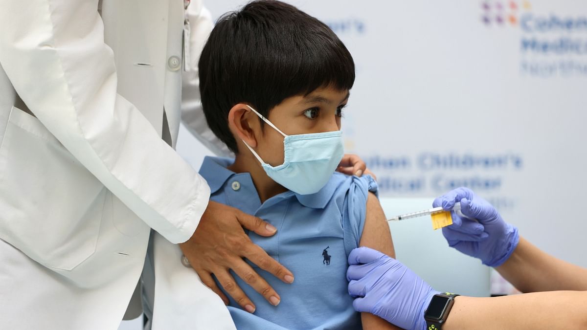 A kid is clicked receiving the Pfizer-BioNTech Covid-19 vaccine at Cohen Children's Medical Center after vaccines were approved for children aged 5-11, in New York, US. Credit: Reuters Photo