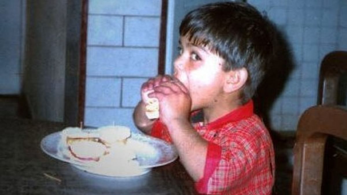 Young Virat is seen gorging on some homemade burgers. Credit: Instagram/virat.kohli.forever___