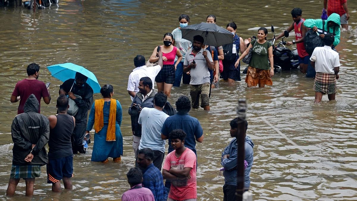 Fortunately, daily life in Chennai and its neighbourhood is slowly limping back to normalcy as water levels are slowly reducing. Credit: AFP Photo