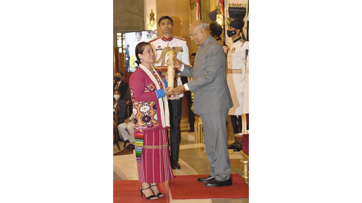 President Ram Nath Kovind presents Padma Shri to Dr Anshu Jamsenpa for Sports, at Rashtrapati Bhavan in New Delhi. She holds two world records, viz., the fastest woman mountaineer to summit Mount Everest twice in 5 days and the first woman mountaineer for double ascents of Mount Everest. Credit: Twitter/@rashtrapatibhvn