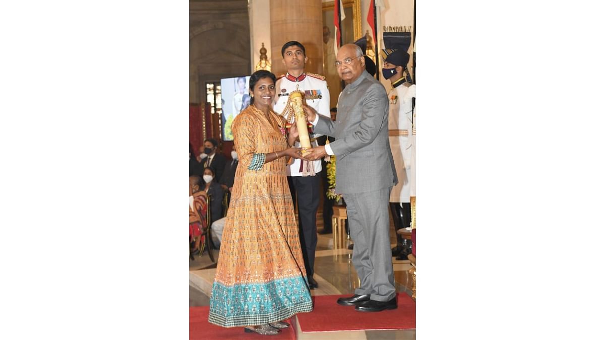 President Ram Nath Kovind presents Padma Shri to P Anitha for Sports, at Rashtrapati Bhavan in New Delhi. She has represented Indian National basketball women team for 18 years. She is the youngest ever player to have captained the senior Indian side at the age of 19. Credit: Twitter/@rashtrapatibhvn