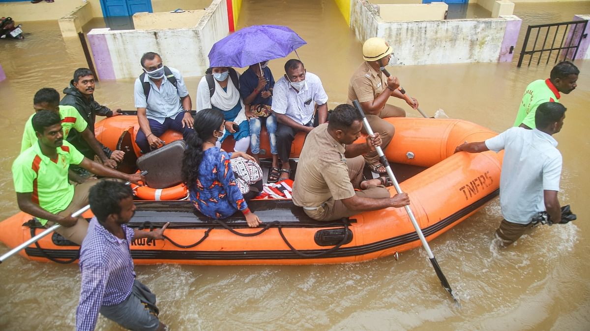 Rescue and relief operations are on in full swing in flood stricken Kanyakumari. IN this photo, Nagercoil Municipal Corporation are seen helping residents. Credit: PTI Photo