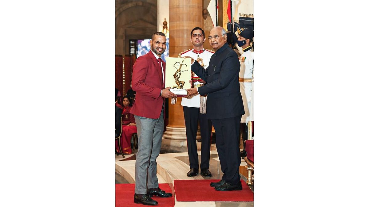 President Kovind confers Arjuna Award 2021 on Shikhar Dhawan in recognition of his outstanding achievements in Cricket, in New Delhi. Credit: Twitter/@rashtrapatibhvn
