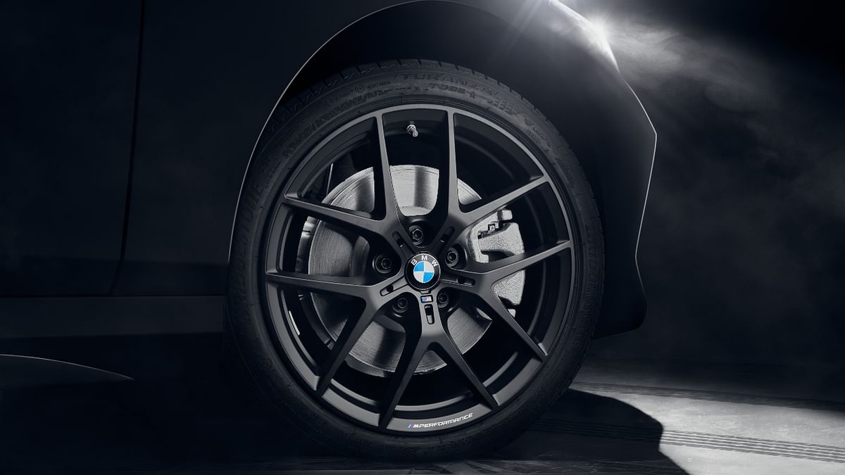 The 18-inch M Performance Y-Spoke Styling 554 M forged wheels in Jet Black Matt add to the sporty visual appeal of the car. Credit: BMW