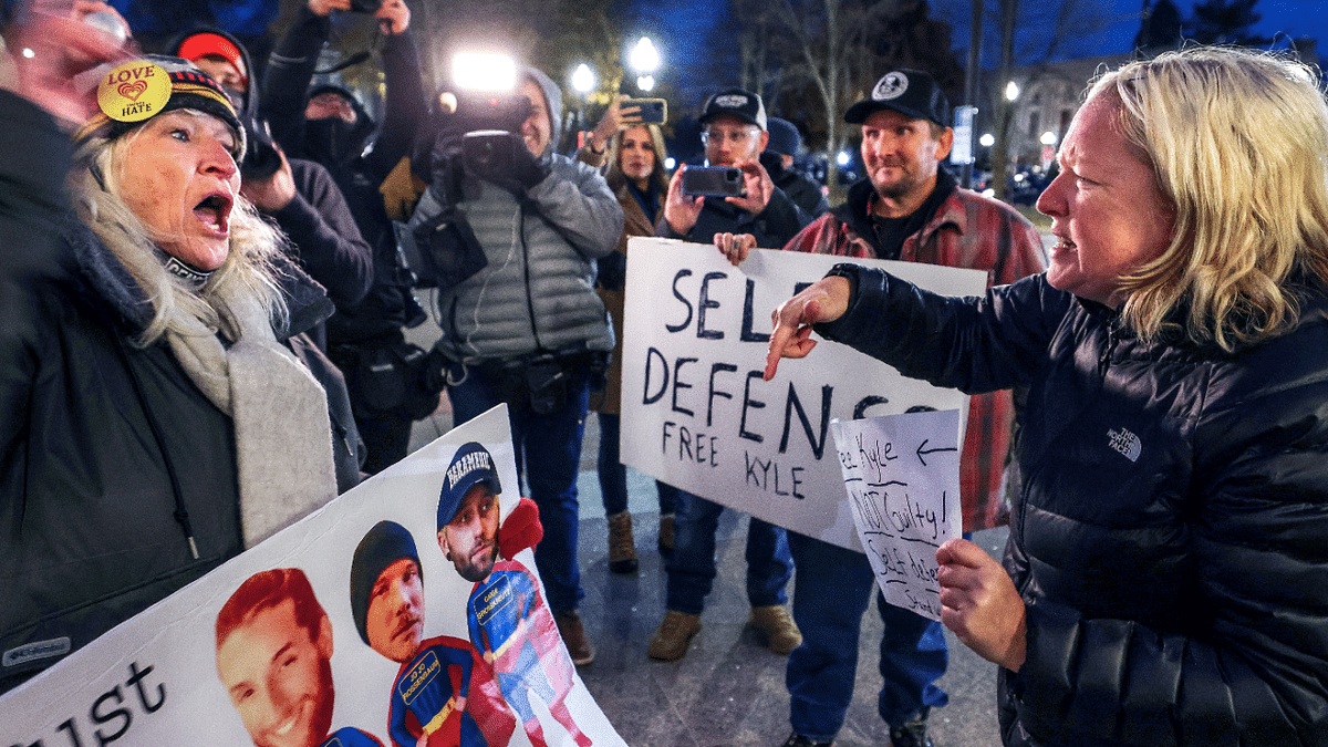 Protestors demonstrate outside the Kenosha County Courthouse during the trial of Kyle Rittenhouse in Wisconsin, US. Credit: Reuters Photo
