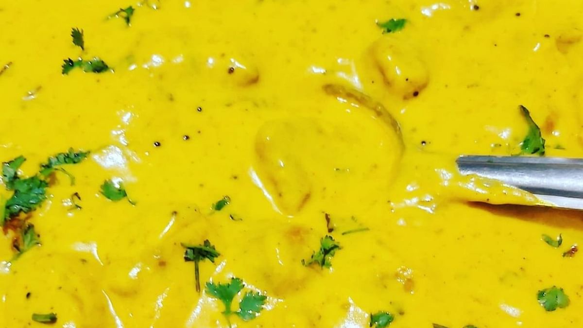 Punjabi Kadhi: The quintessential Punjabi Kadhi is a yoghurt soup thickened with gram flour served along with steamed rice and roti. Credit: Instagram/payalspassions