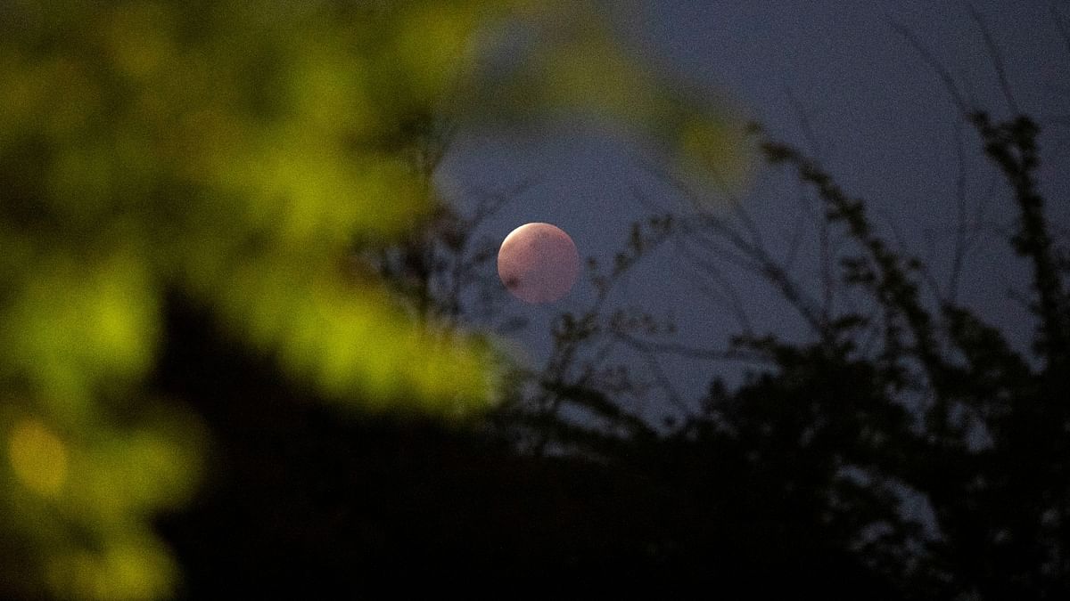 A partial lunar eclipse dubbed the 'blood moon' is seen in Santiago, Chile. Credit: Reuters Photo