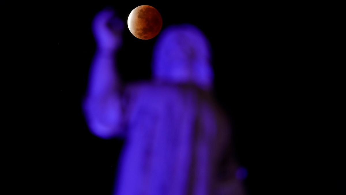 A shadow falls on the moon as it undergoes a partial lunar eclipse as seen from San Salvador, El Salvador. Credit: Reuters Photo