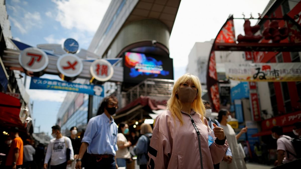 Shoppers walk at the Ameyoko shopping district, where Tokyo’s biggest street food market is located. Credit: Reuters Photo