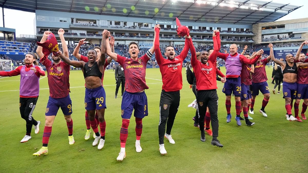 Real Salt Lake players celebrate after defeating the Sporting Kansas City in the conference semifinals of the 2021 MLS playoffs