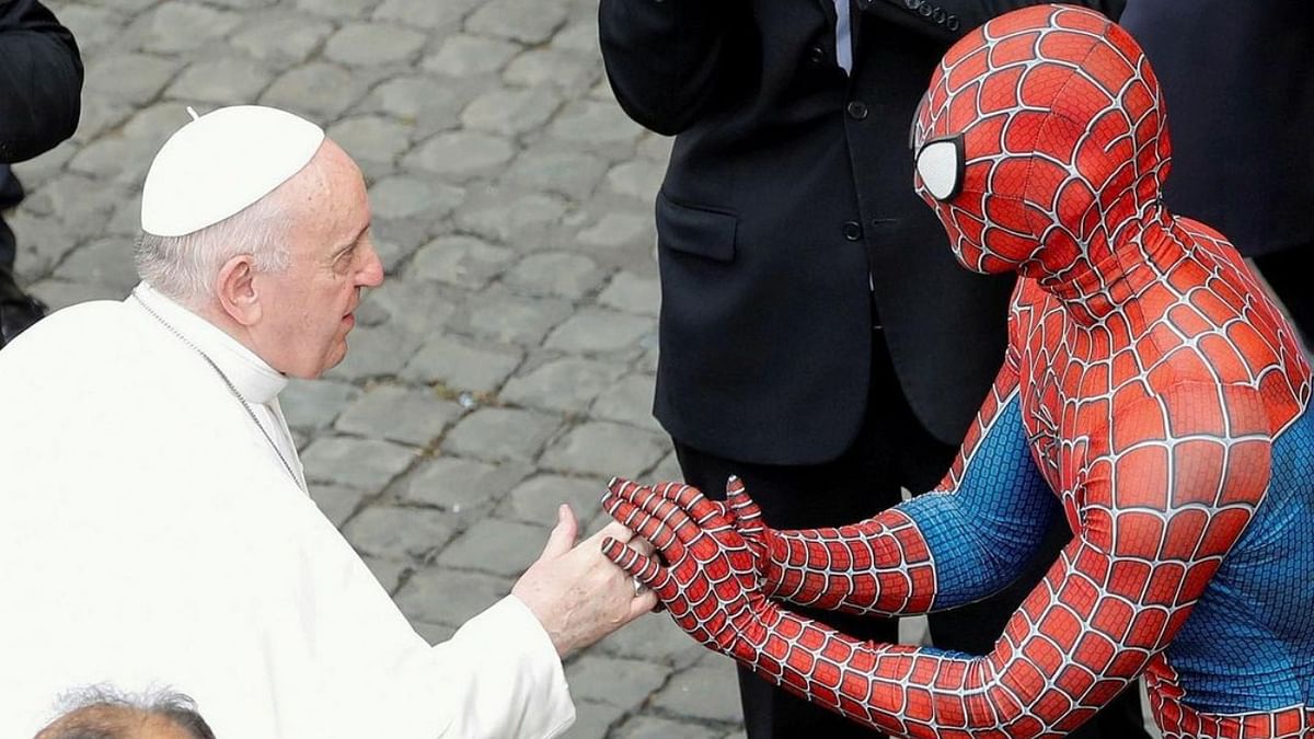 Pope Francis greets a person dressed as Spider-Man after the general audience, amid the coronavirus pandemic, at the Vatican, June 23. Credit: Instagram/@reuters