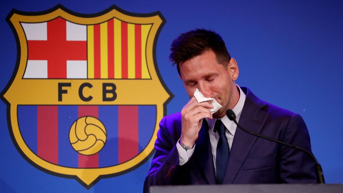 Lionel Messi gets emotional while addressing the media during a press meet after exiting Barcelona. Credit: Reuters Photo