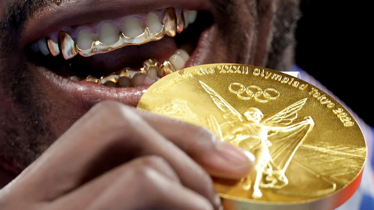Alluring photo of Cuban boxer Julio Cesar La Cruz celebrating his gold medal win. Credit: Reuters Photo