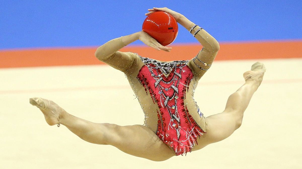 A perfectly timed photo of Israel's Linoy Ashram during the Rhythmic Gymnastics individual ball final. Credit: Reuters Photo